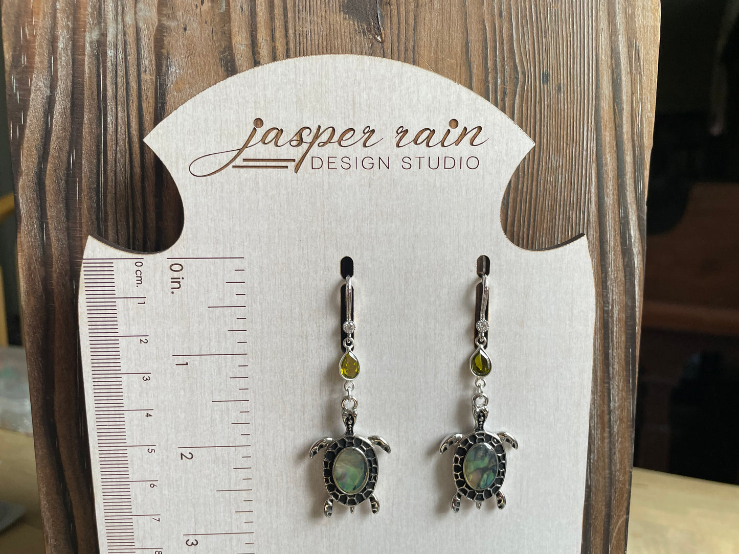 Silver Sea Turtle Charm earrings with Abalone and Peridot on silver plated hooks