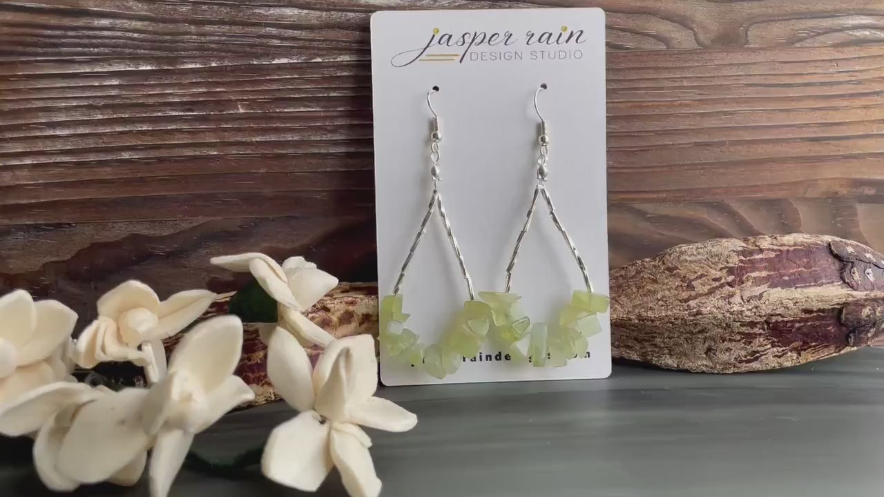 Gemstone drop earrings with prehnite chips and stainless steel beads.