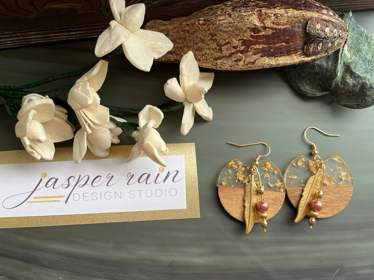 Wood, resin with gold flakes, pearl and gold feather earrings