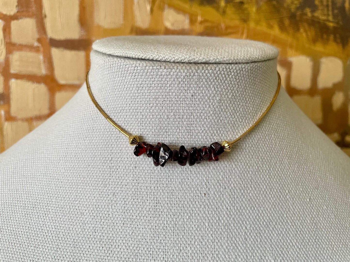 Garnet and gold or silver collarbone-length necklaces. Simple & Elegant