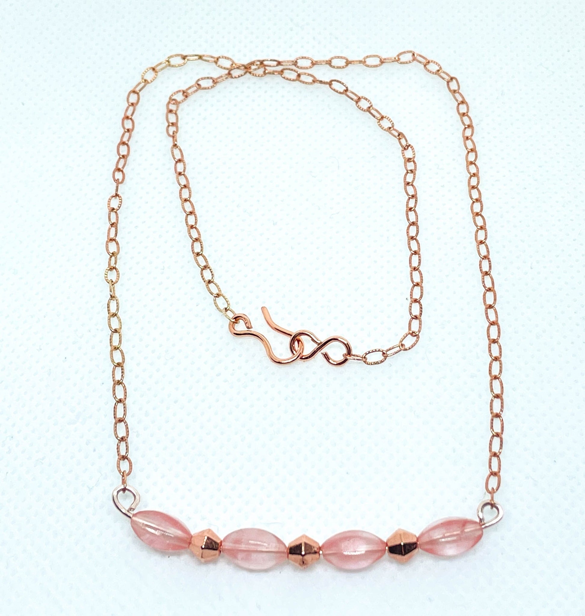 Rose gold and strawberry glass necklace