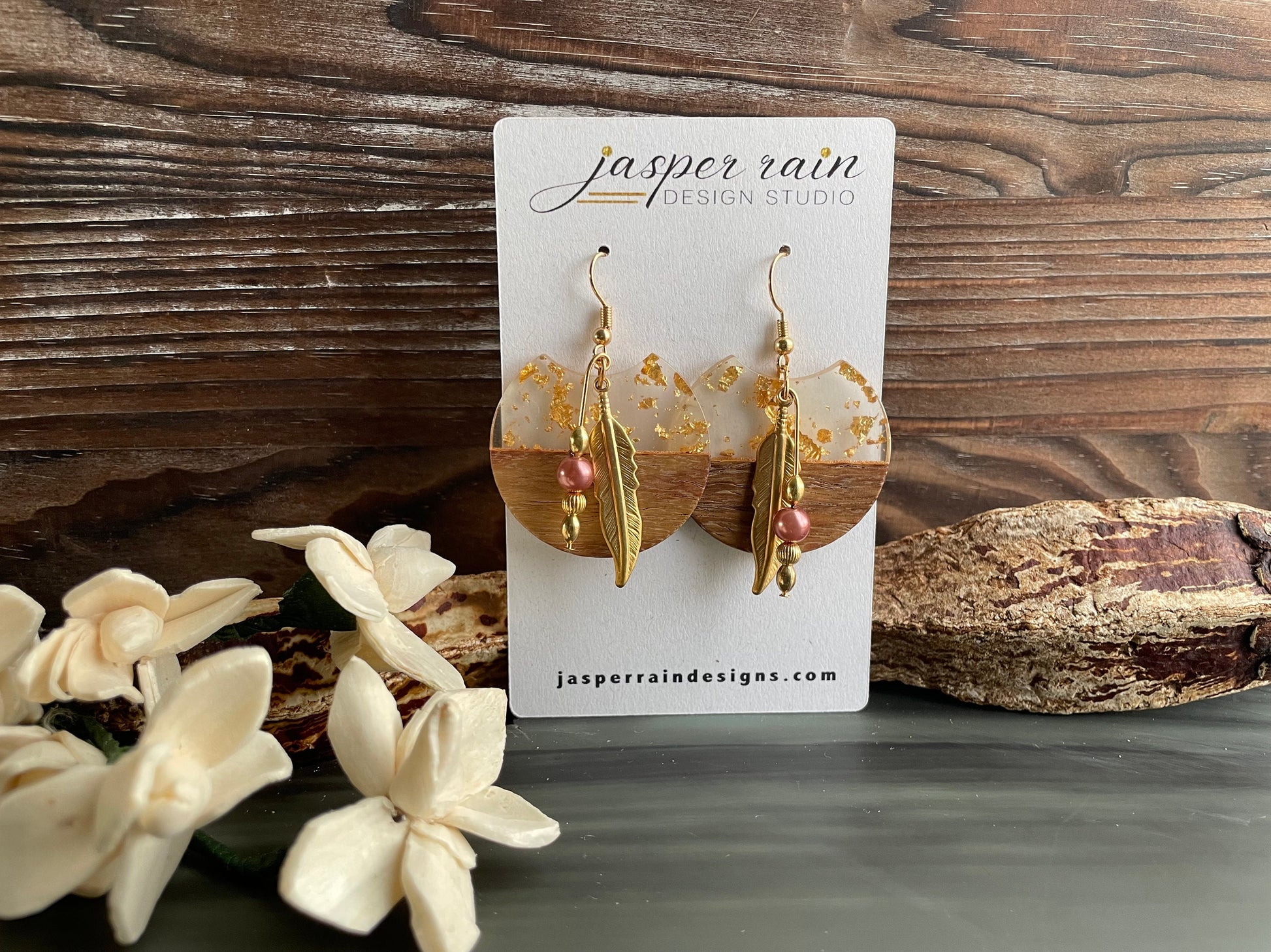 Wood, resin with gold flakes, pearl and gold feather earrings