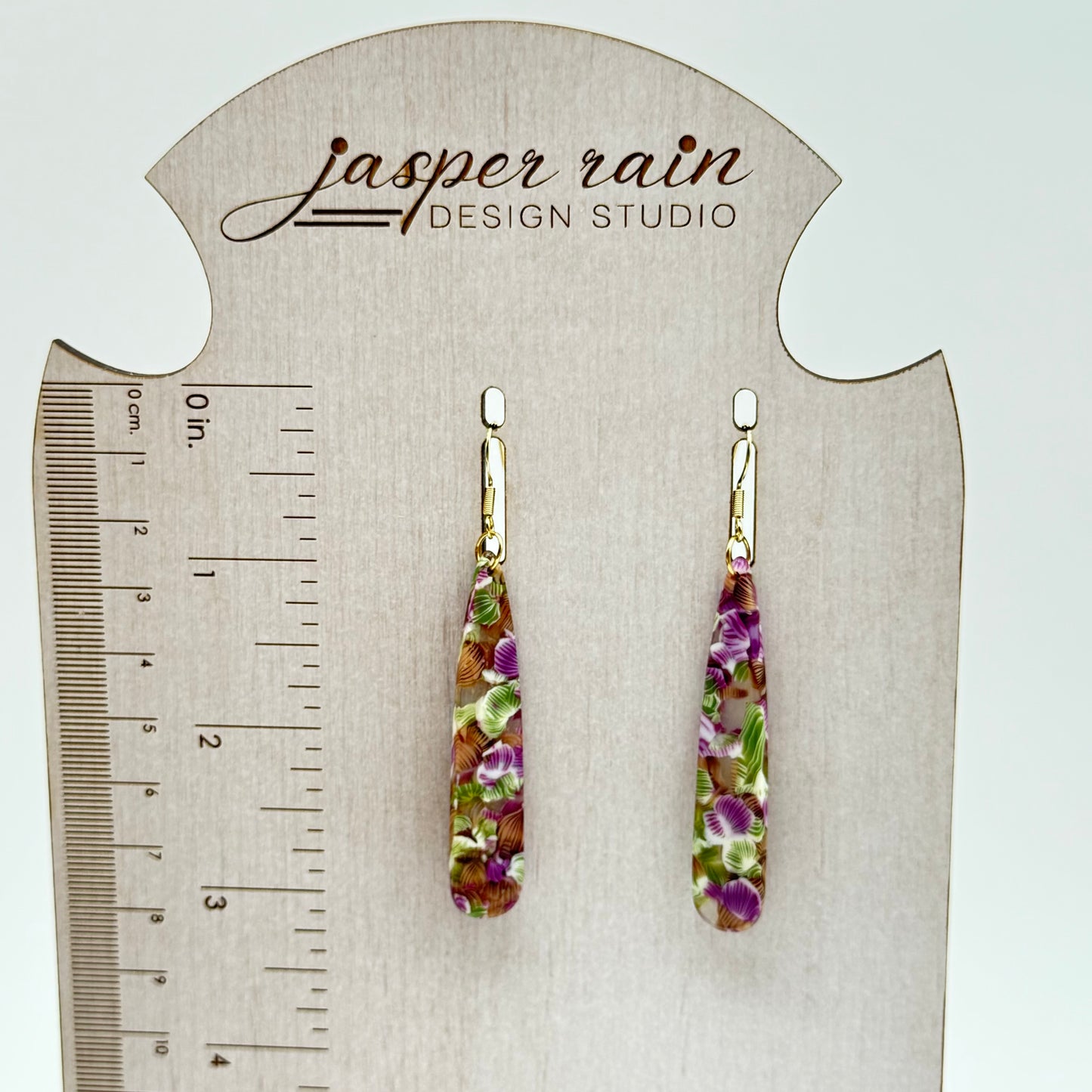 Purple and green flowers in resin long dangle earrings