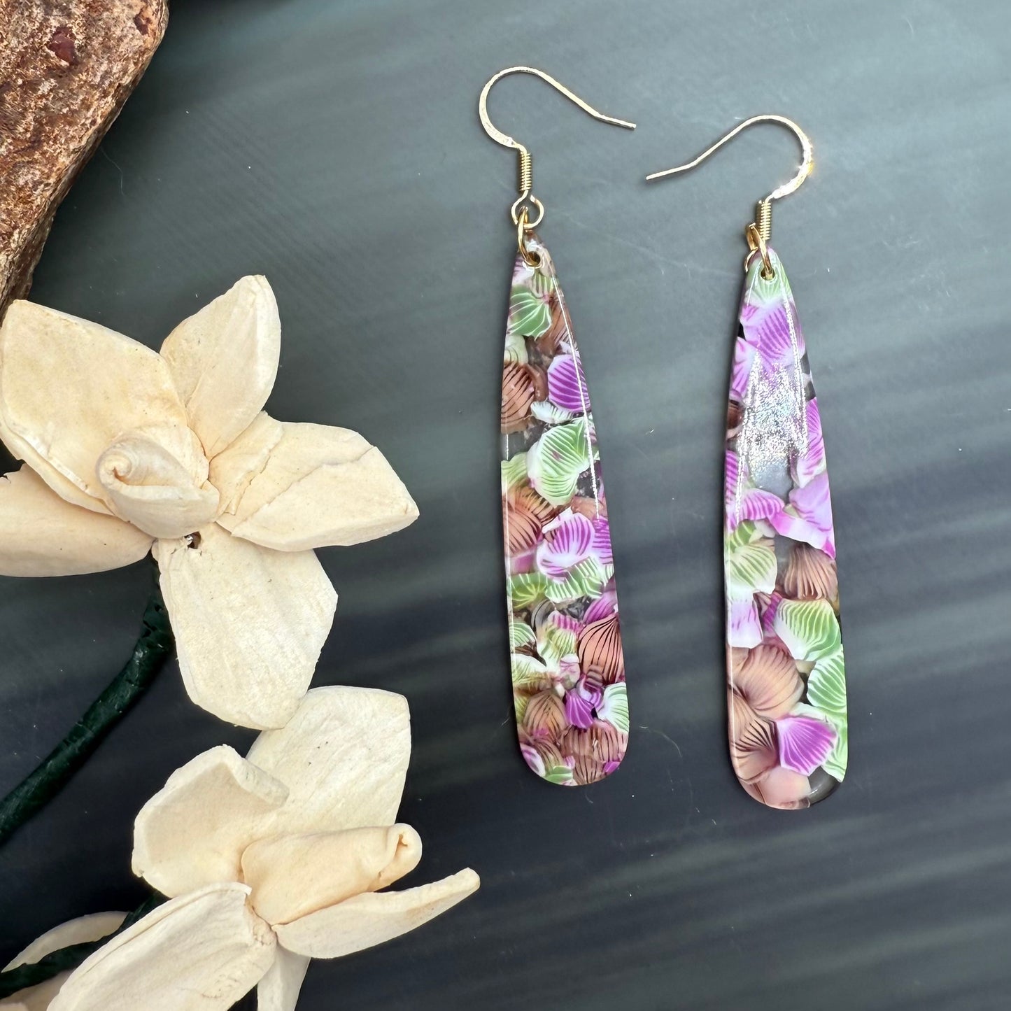 Purple and green flowers in resin long dangle earrings