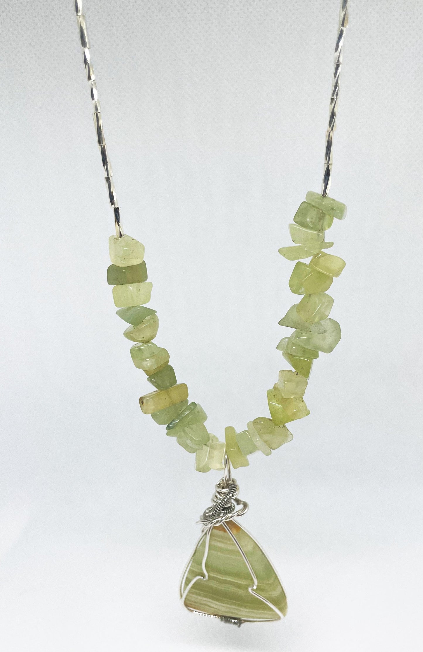 Hand wire wrapped Banded Agate cabochon with Prehnite chips and stainless steel beaded necklace. Handmade gemstone necklace. One-Of-A-Kind