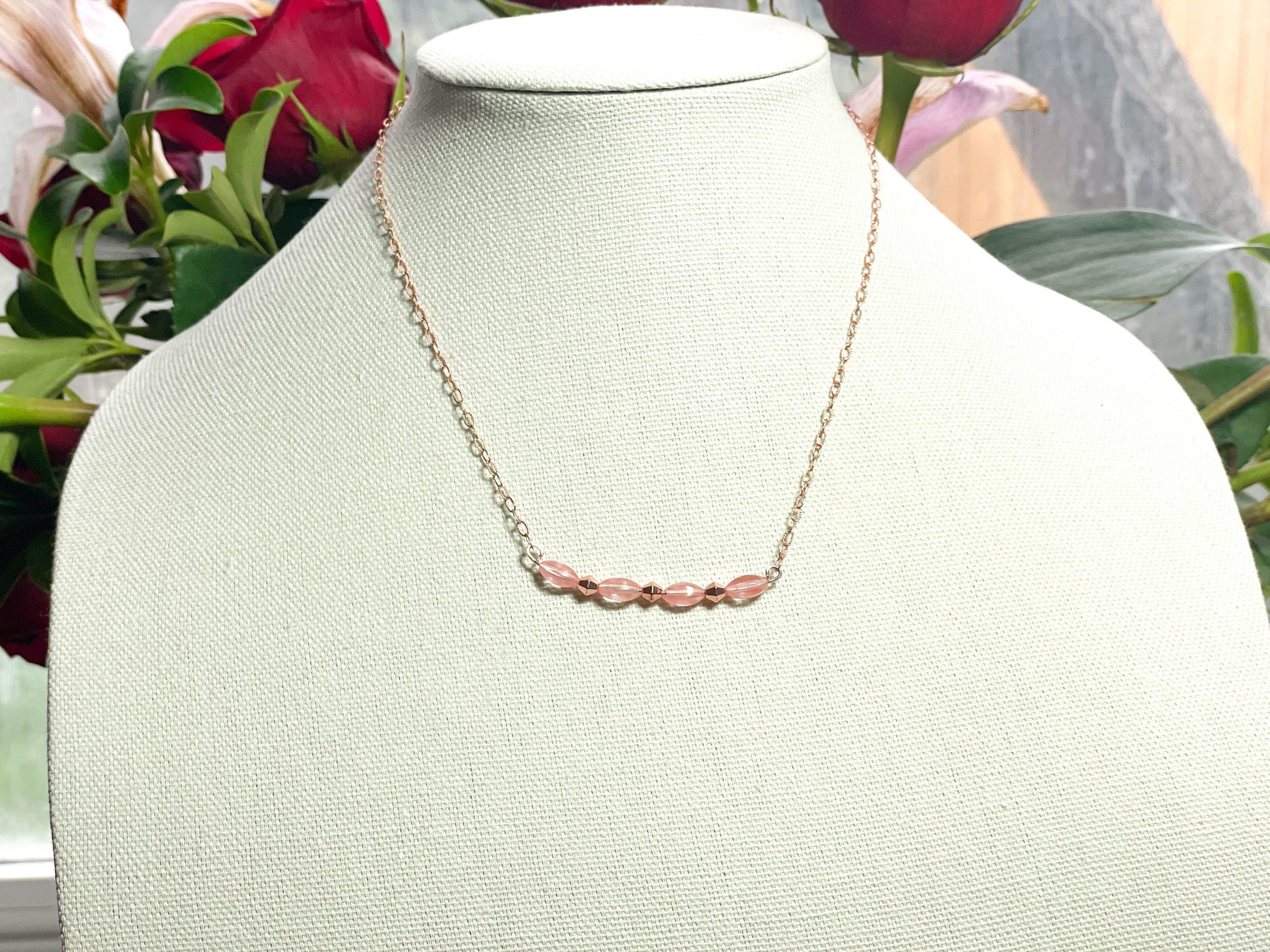Rose gold and strawberry glass necklace