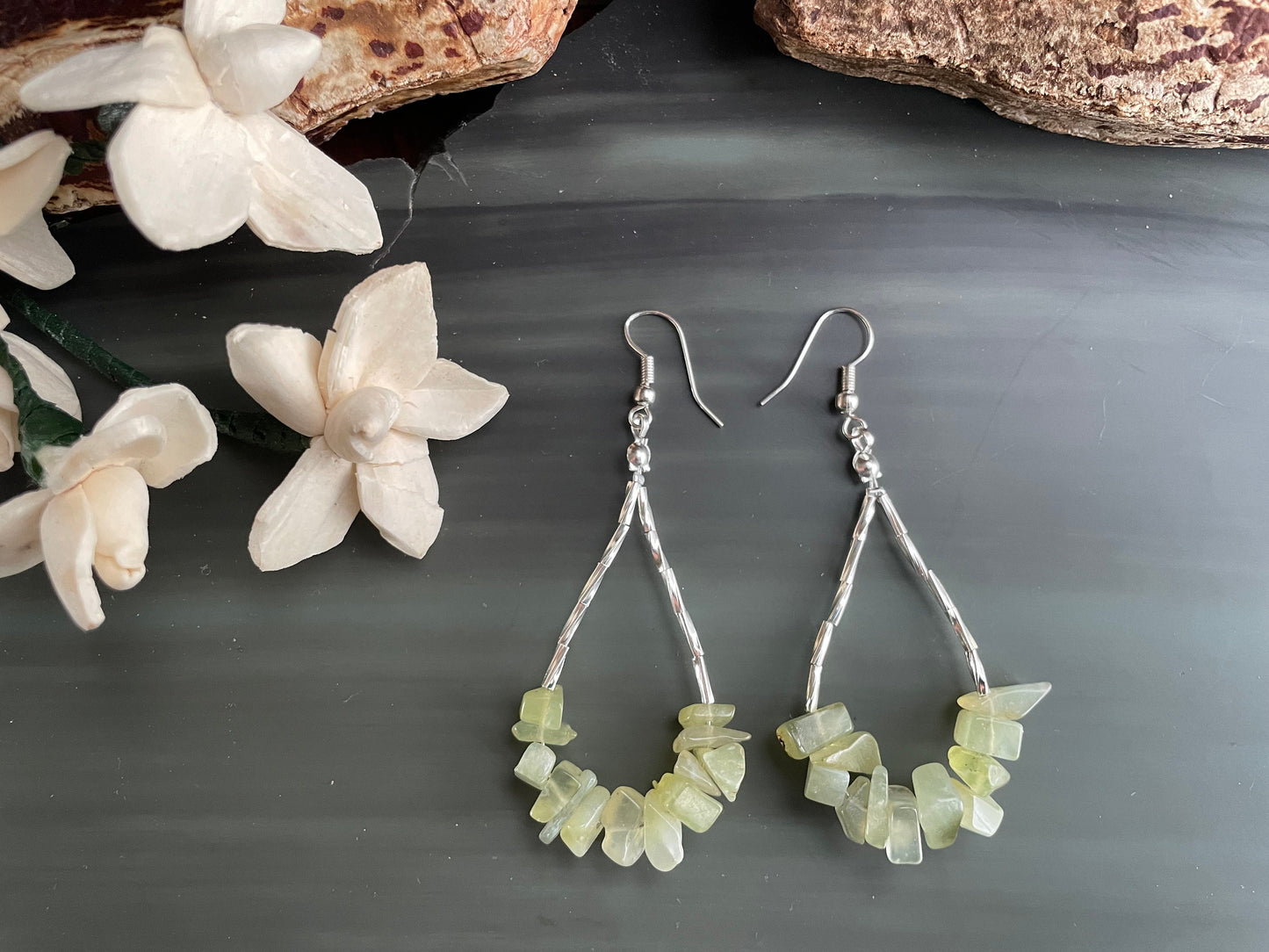Gemstone drop earrings with prehnite chips and stainless steel beads.